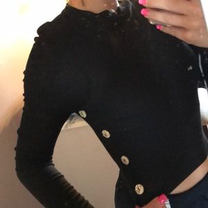 Black long sleeve with buttons on each side